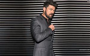 New Zealand actor Karl Urban gives a dashing look for the camera